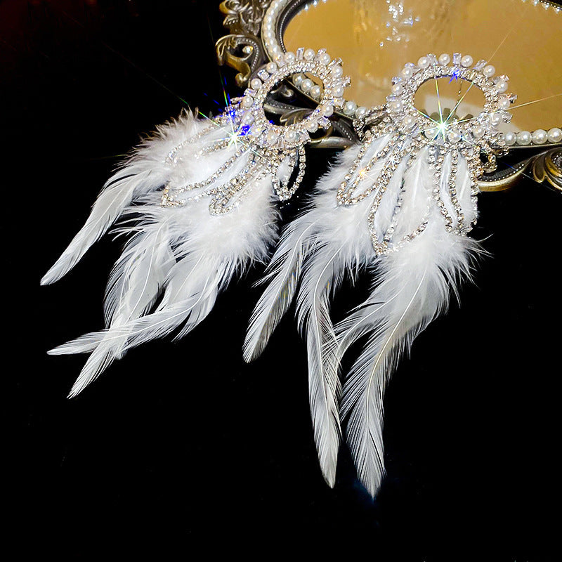 Wholesale Diamond studded bow feather tassel earrings