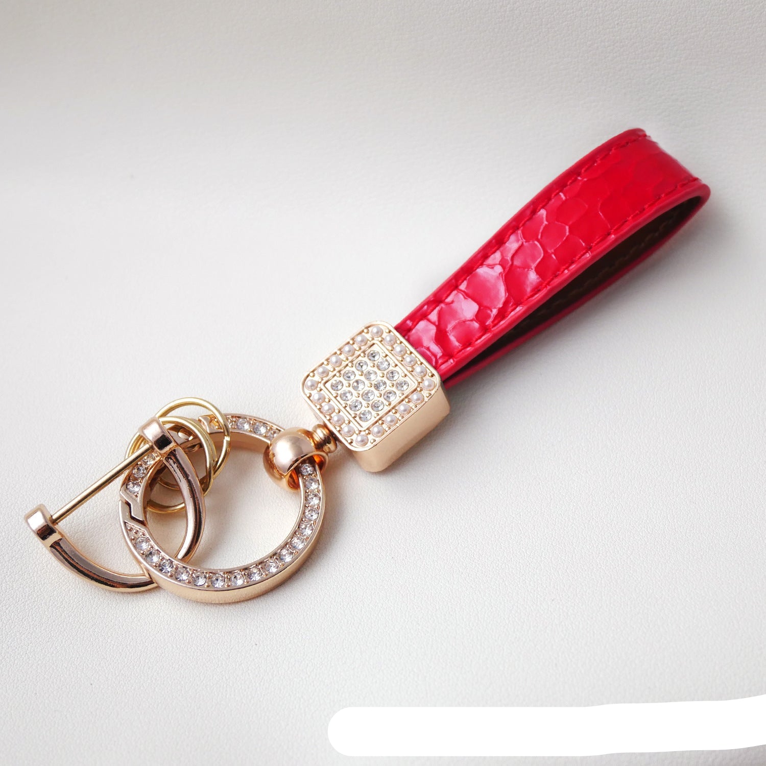 Wholesale Fashionable textured diamond spring ring keychain