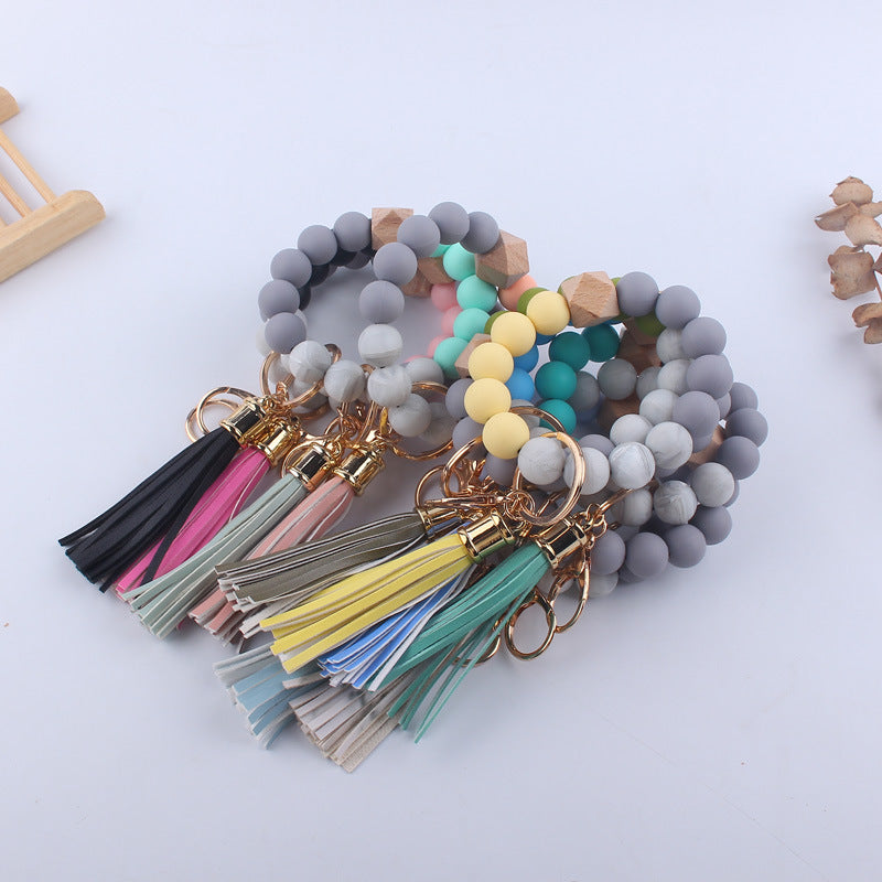 Wholesale Silicone Leather PU Short Tassel DIY Leopard Beaded Bracelet Keychains