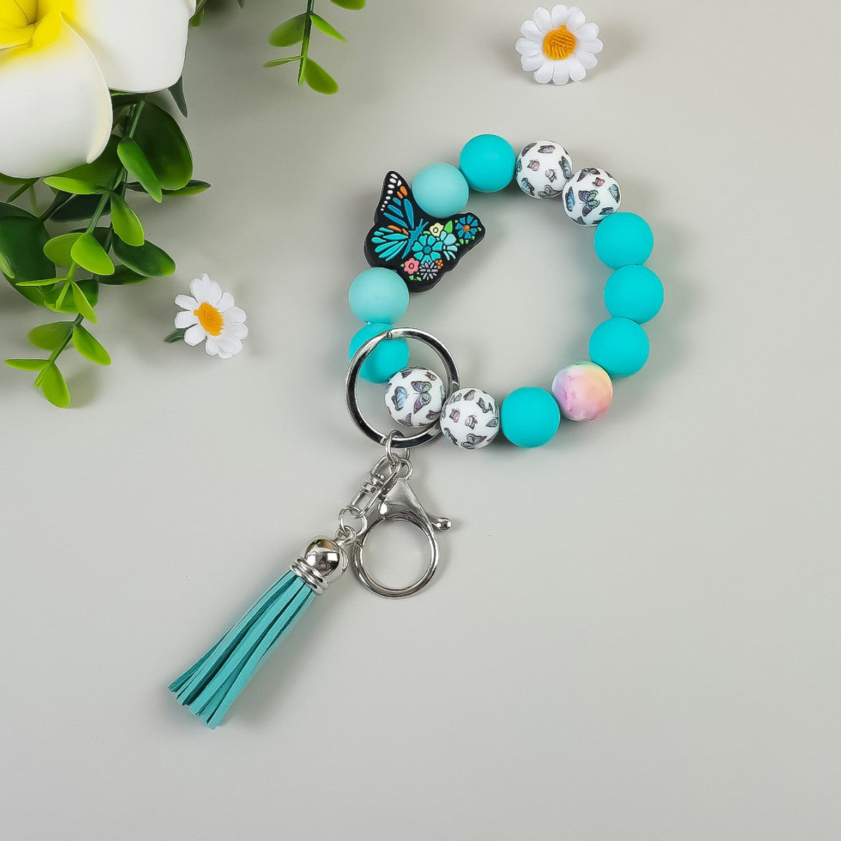 Wholesale Butterfly Pendant Beaded Wristlet Keychain Solid Color Silicone Wooden Keychain