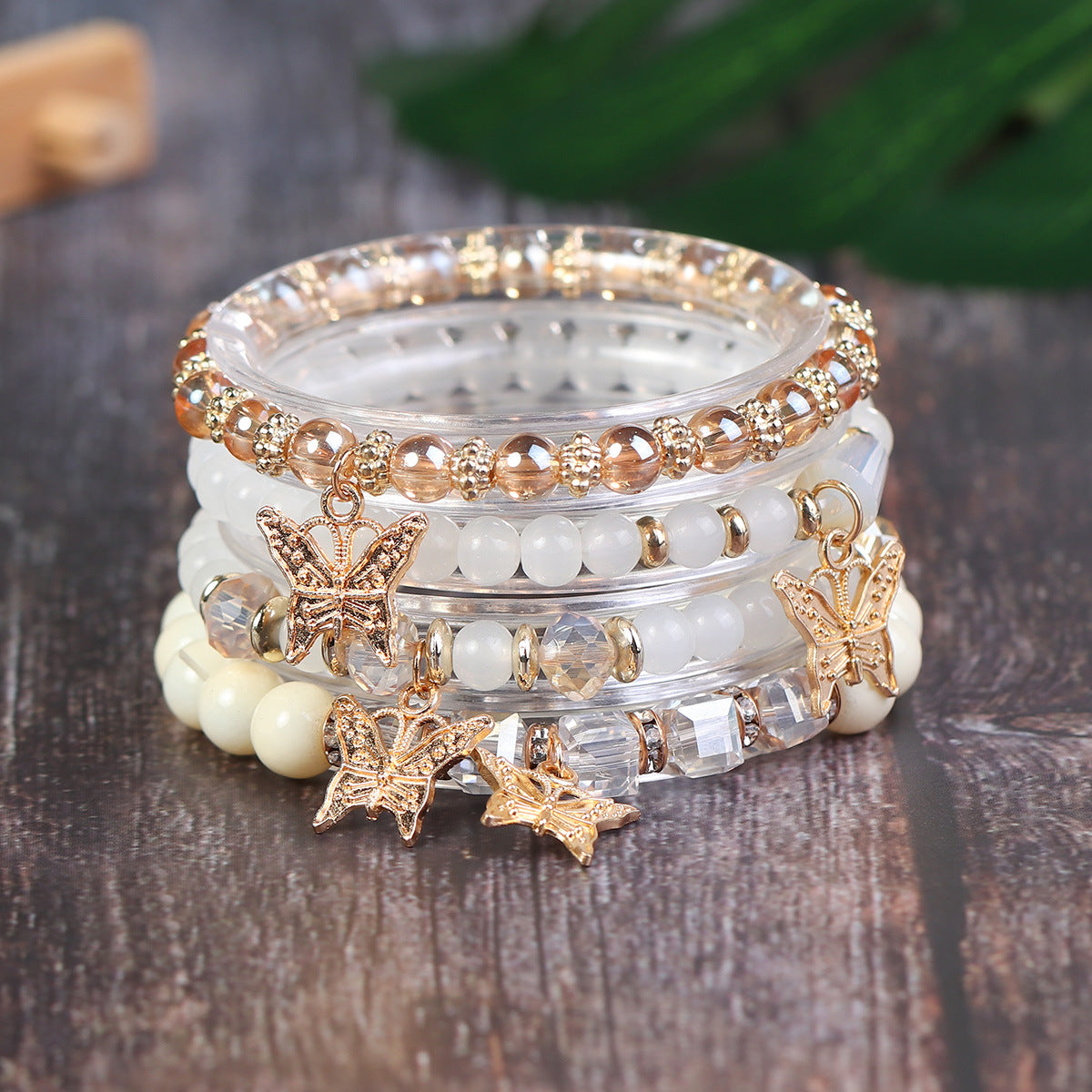 Wholesale Four Layer Butterfly Pendant Glass Elastic Bracelet