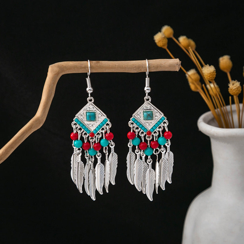 Wholesale Ethnic Style Long Style Feather Tassel Alloy Earrings