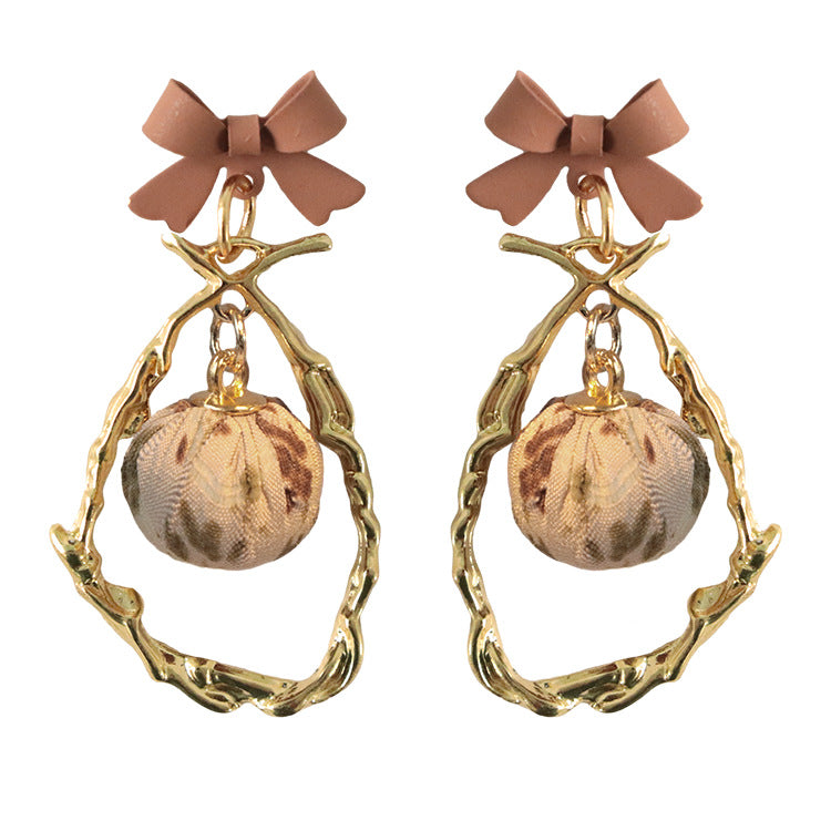 Wholesale Bow Hollow Alloy Earrings