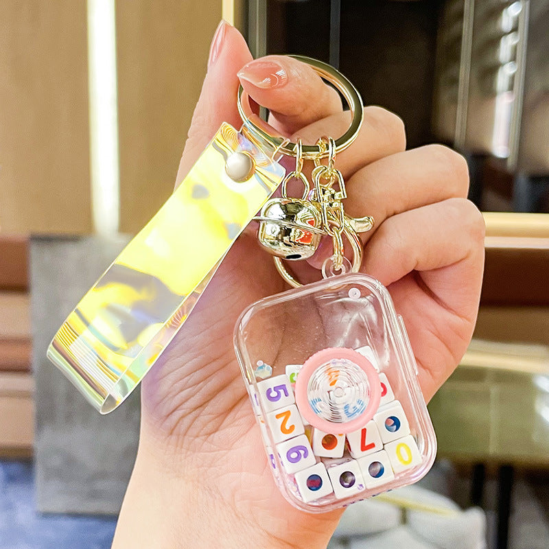 Wholesale Oil Floating Camera Quicksand Bottle Acrylic Keychain