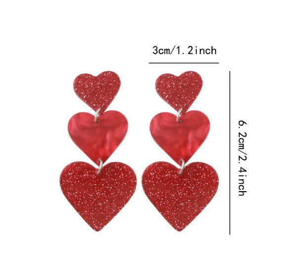 Wholesale  Heart-shaped Stud Earrings With a Triple Dangle Design.