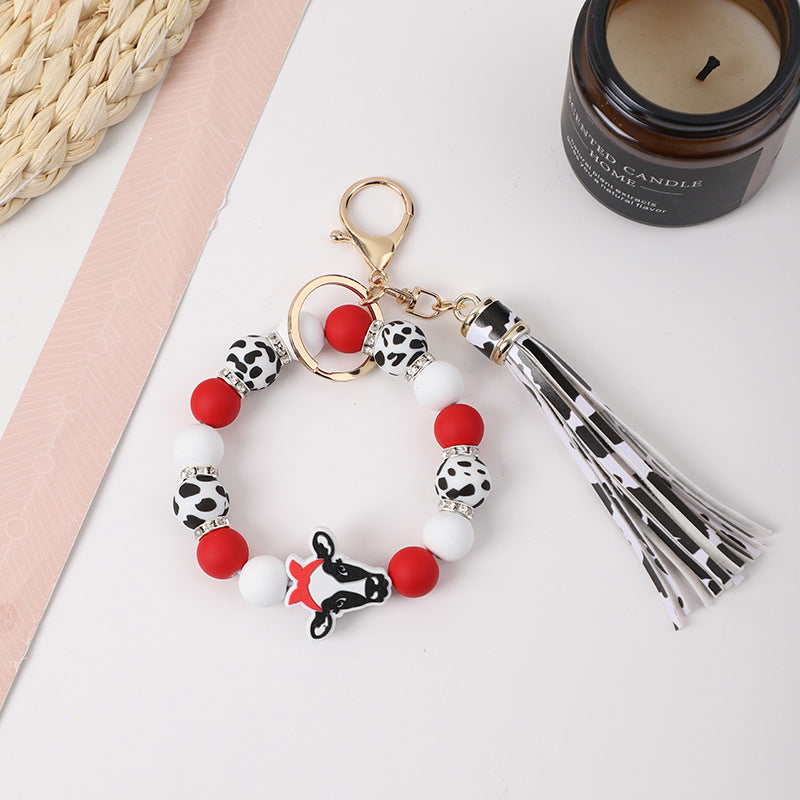 Llavero de muñeca de silicona de borla al por mayor