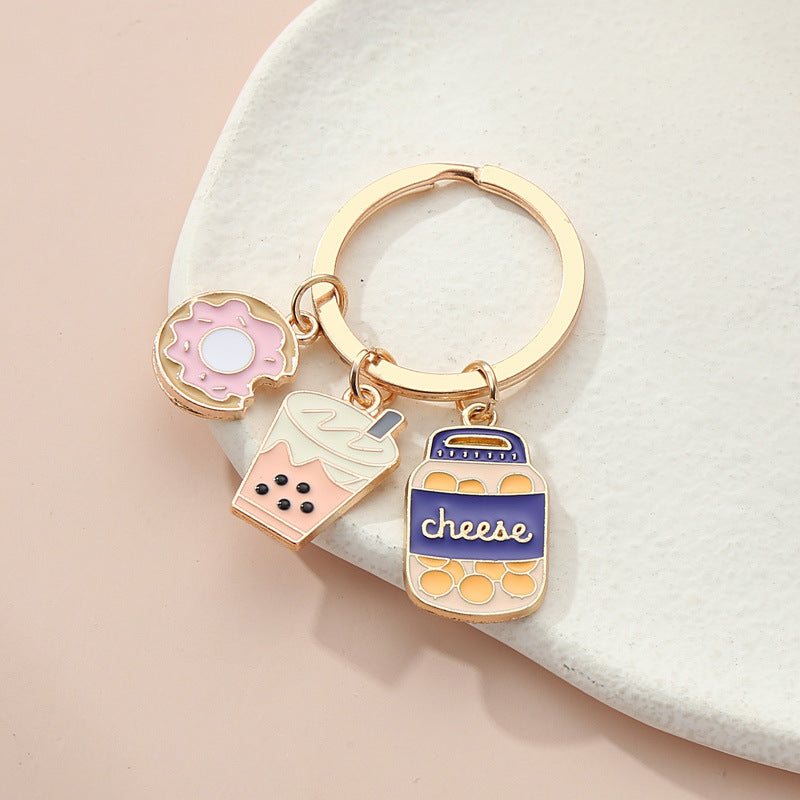Chips de té de leche de pastel de metal al por mayor llavero