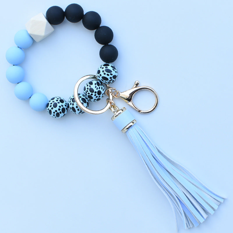 Wholesale Colorful leopard print silicone beaded bracelet keychain PU tassel pendant