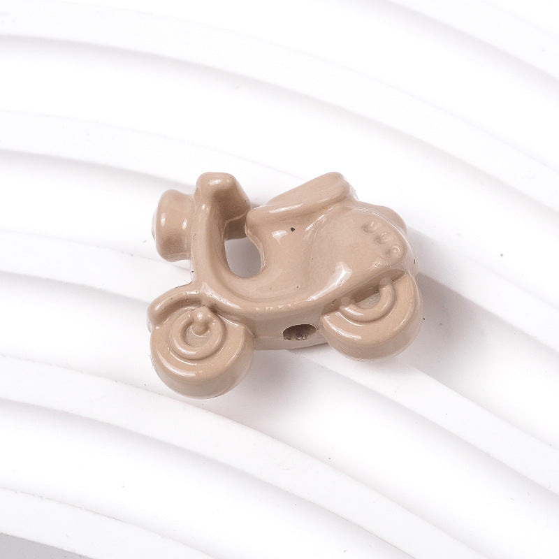 Wholesale of 100PCS/PACK Cartoon Small Motorcycle Perforated Paint Motorcycle Resin Beads