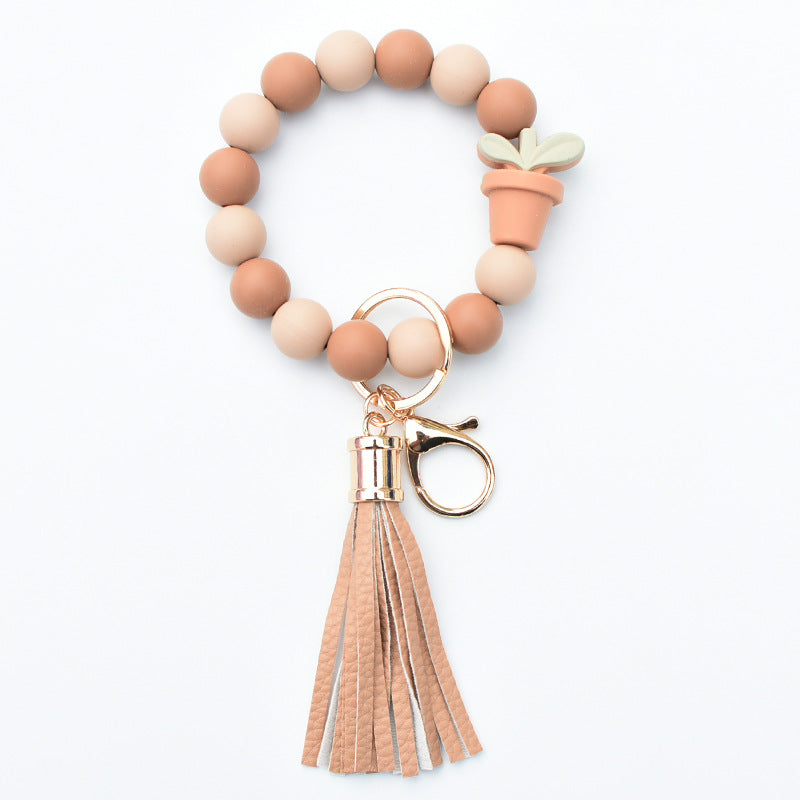 Wholesale Potted Silicone Beaded Leather Tassel Wrist Keychain