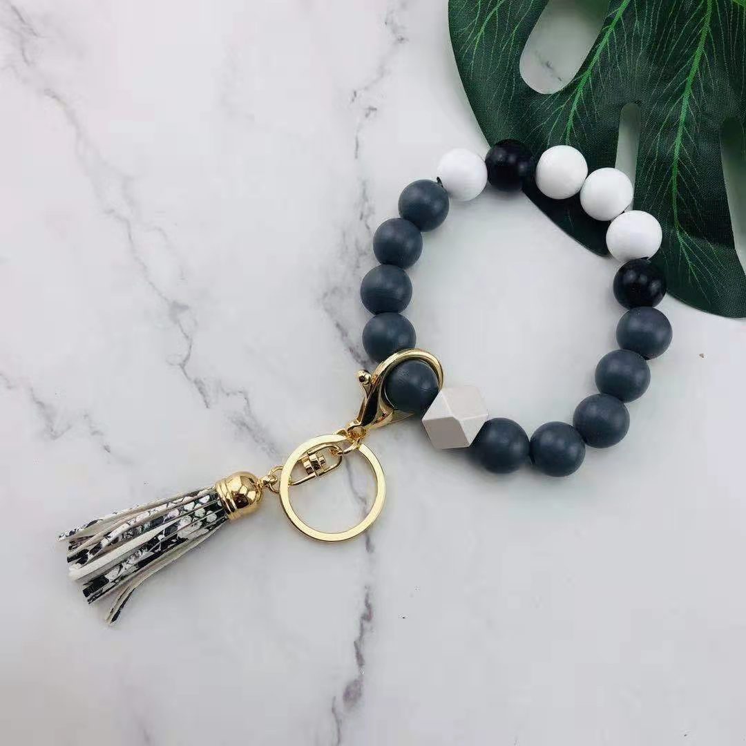 Llavero de muñeca con cuentas de silicona al por mayor