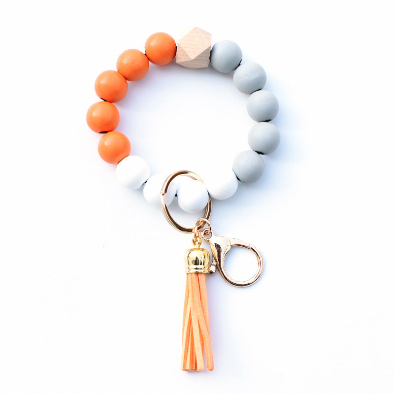Llavero de muñeca con cuentas de silicona colorida al por mayor