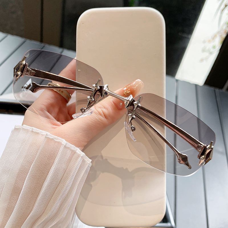 Wholesale Frameless cut edge sunglasses metal glasses star sunglasses
