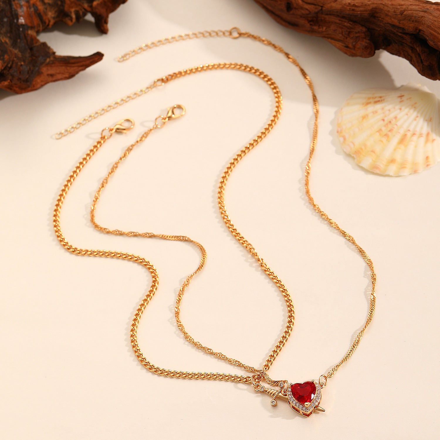 Wholesale  One-Arrow-Through-The-Heart Red Zircon Heart Dagger Pendant  Alloy Necklace