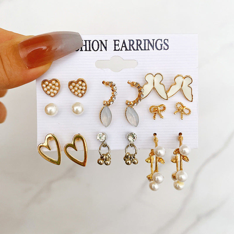 Wholesale Acrylic Pearl Butterfly Heart Hollow Love Earrings Set