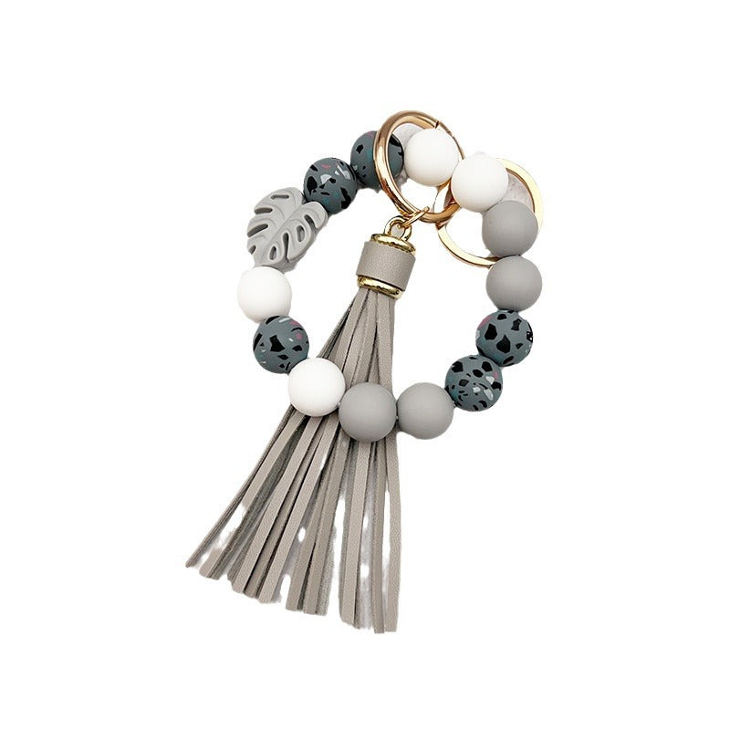 Wholesale leaf silicone printing silicone beaded tassel Wrist keychain