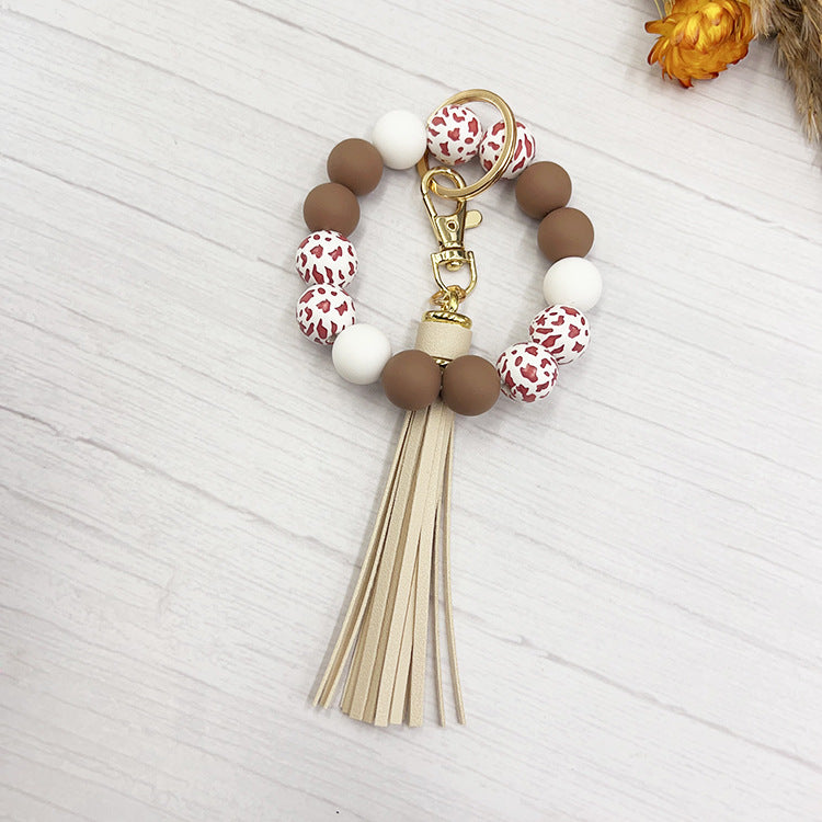 Wholesale Western Style Cow Grain Wood Beads Silicone Handmade Keychain Bag Key Accessories