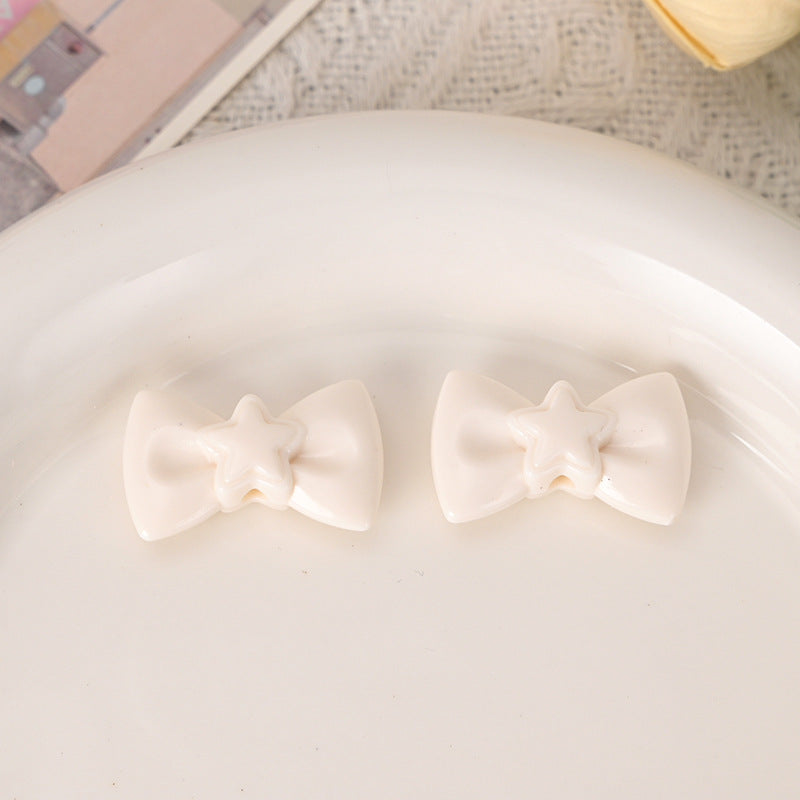 Wholesale  5pcs/pack  cute macaron-colored hollowed-out five-pointed star bow tie beads Acrylic Beads