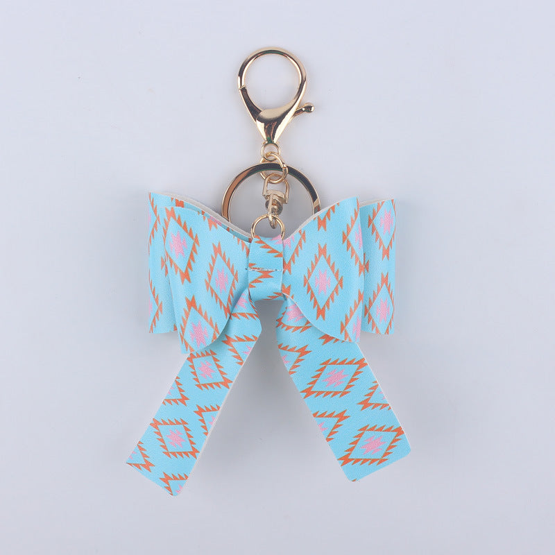 Wholesale Cartoon Aztec Color Bow Leather Keychain
