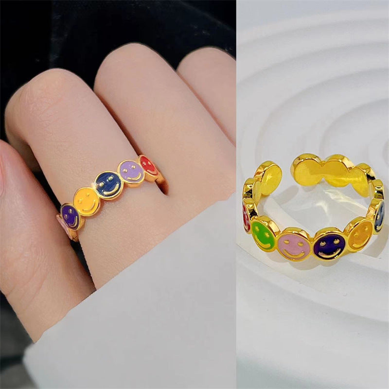 Anillos de cobre de cara sonriente colorido al por mayor