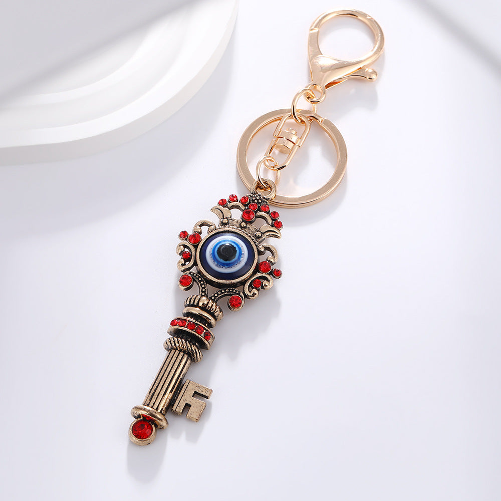 Wholesale Devil' s Eye Key Shape with Water Diamond Metal Keychain
