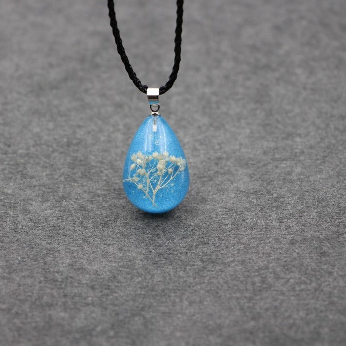 Wholesale Handmade Resin Pendant Necklace With Dried Flowers Blue Glow In The Dark Nature Design Boutique Jewelry Accessory