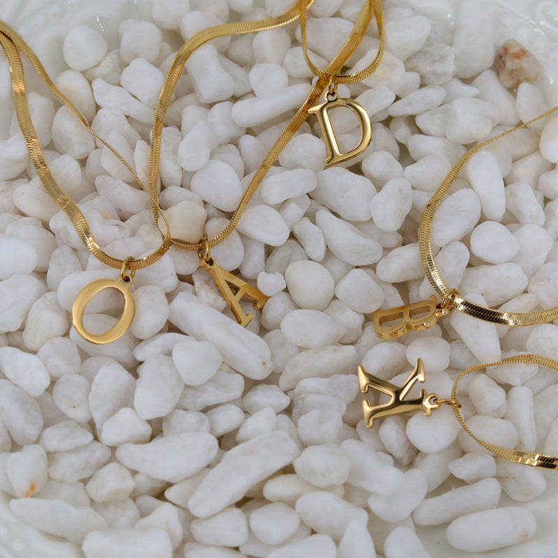 Wholesale Titanium Steel Gold Plated 26 English Letters Snake Bone Flat Necklace