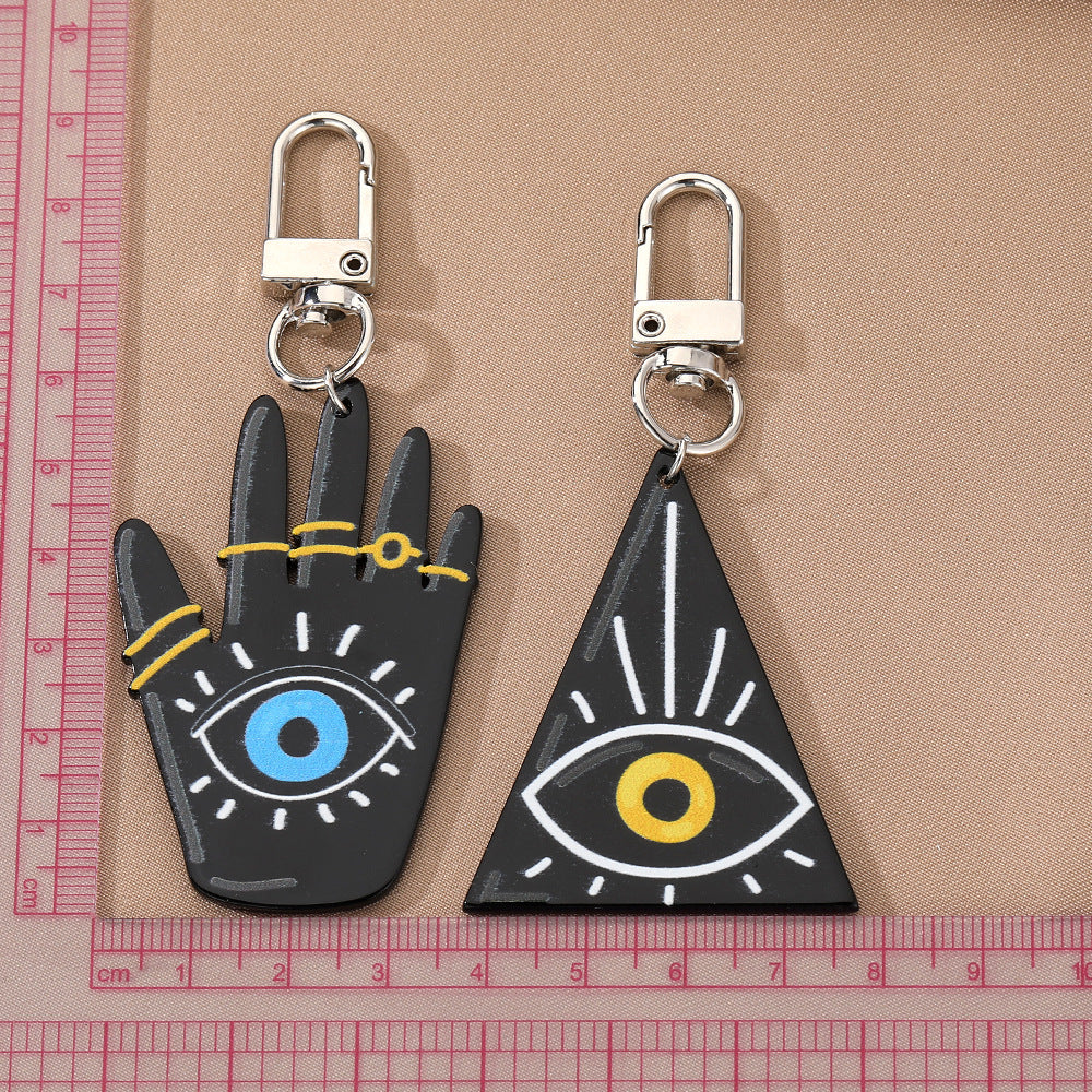 Al por mayor 6 piezas/paquete de viento oscuro Fátima Palm Devil's Eye Plate Keychain