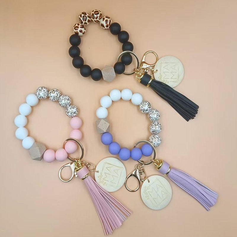 Wholesale Chic Purple Silicone Bead Tassel Keychain Bag Charm With Wooden MAMA Pendant Casual Gift For Couple Car Key Accessory Resale