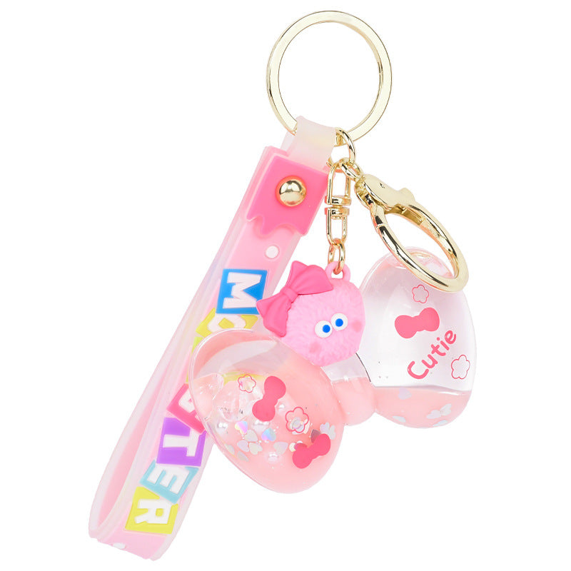 Wholesale PVC Liquid Into The Oil Bow Cartoon Keychain