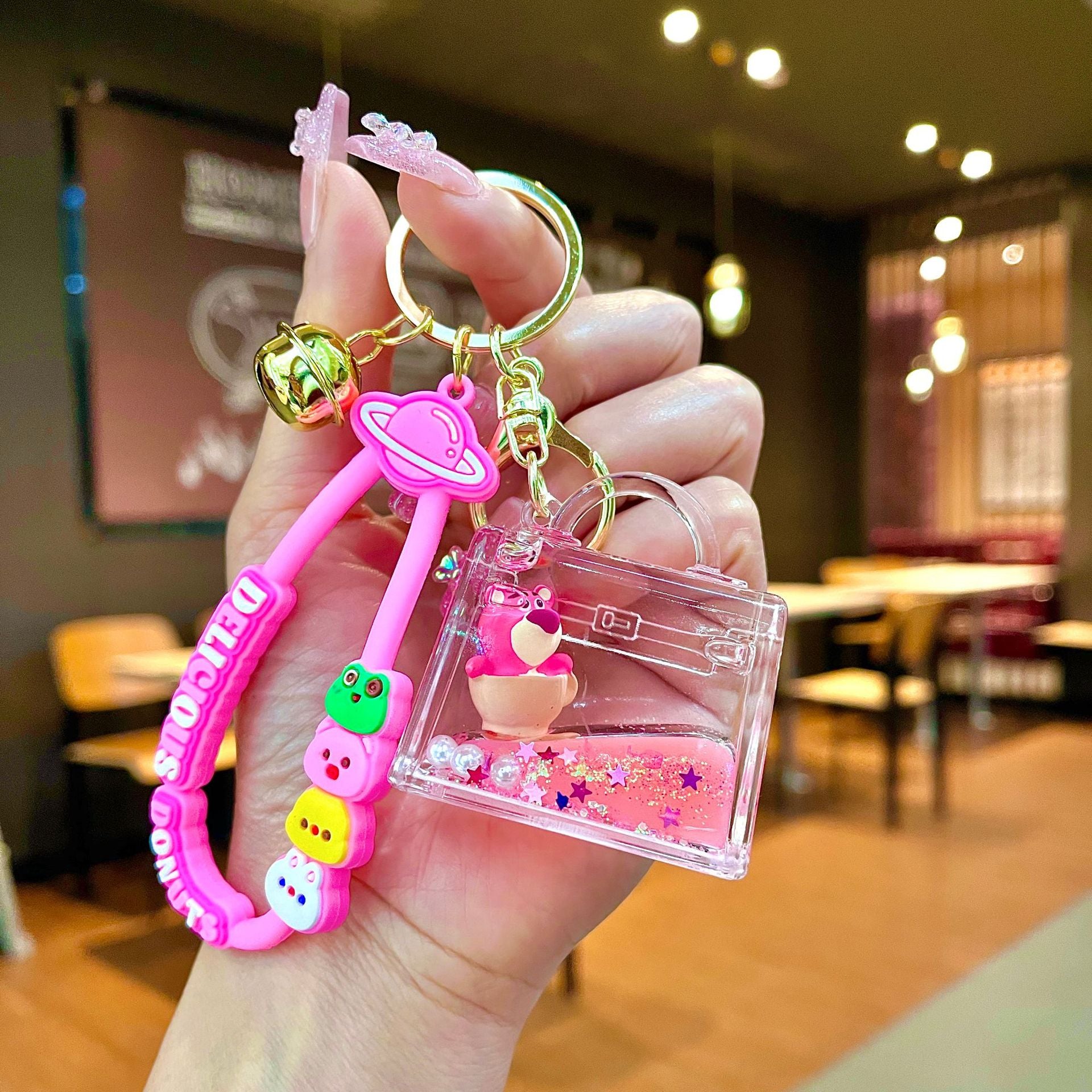 Wholesale Oil filled pink strawberry bear quicksand Keychains