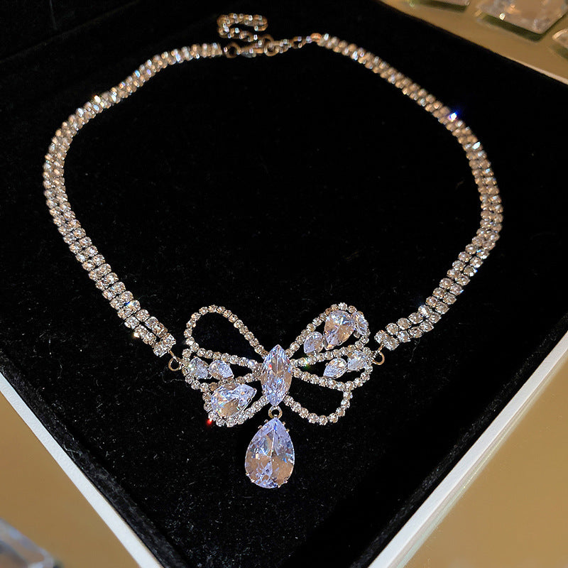 Wholesale Zircon Hollow Bow Teardrop Earrings Necklace Set