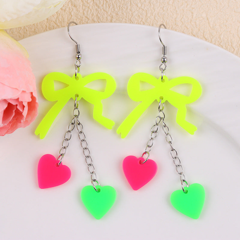 Wholesale Valentine' s Day fluorescent bow heart acrylic earrings