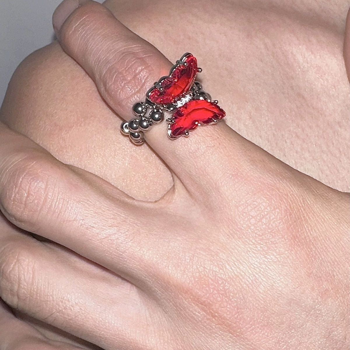 Wholesale Dark diamond studded red and white butterfly ring