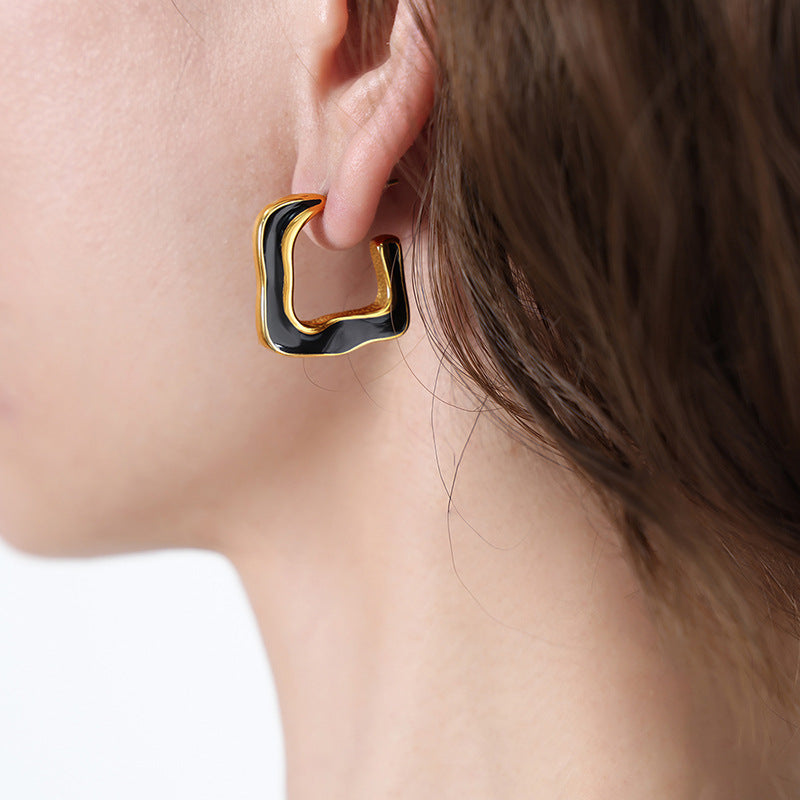 Wholesale Retro Geometric Curved Black Gold Plated Earrings