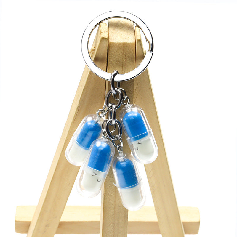 Wholesale Acrylic Cute Smiley Face Capsule Pendant Keychain