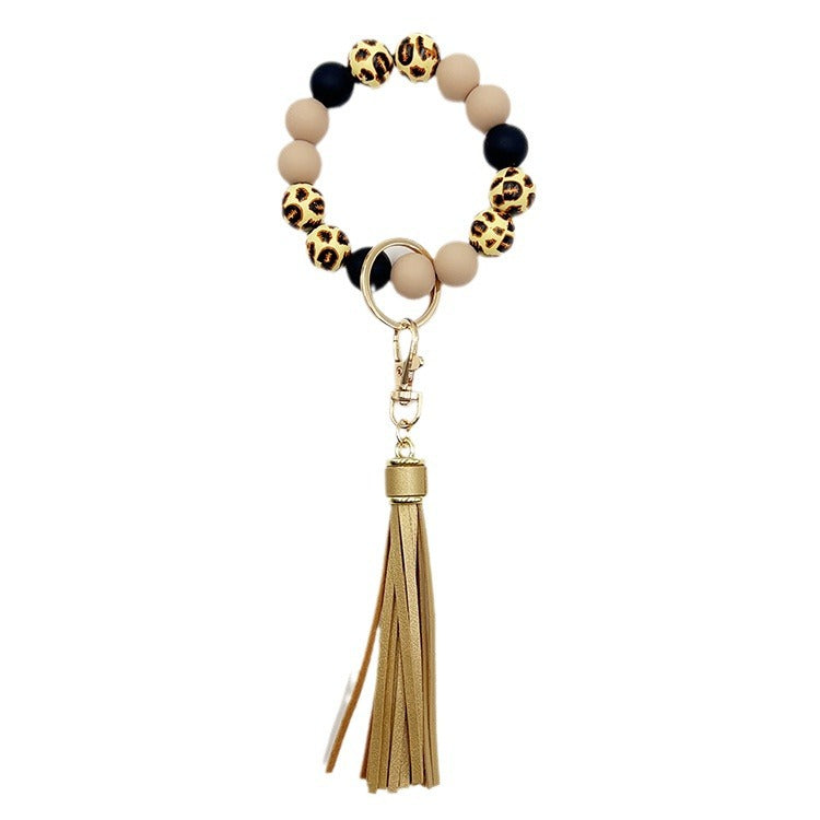 Wholesale Leopard Print Wood Beads Silicone Beaded Bracelet Tassel Key Ring