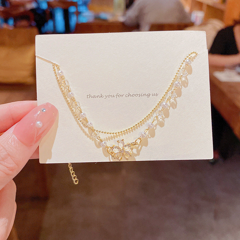 Wholesale Double Layer Pearl Zircon Flower Titanium Steel Bracelet