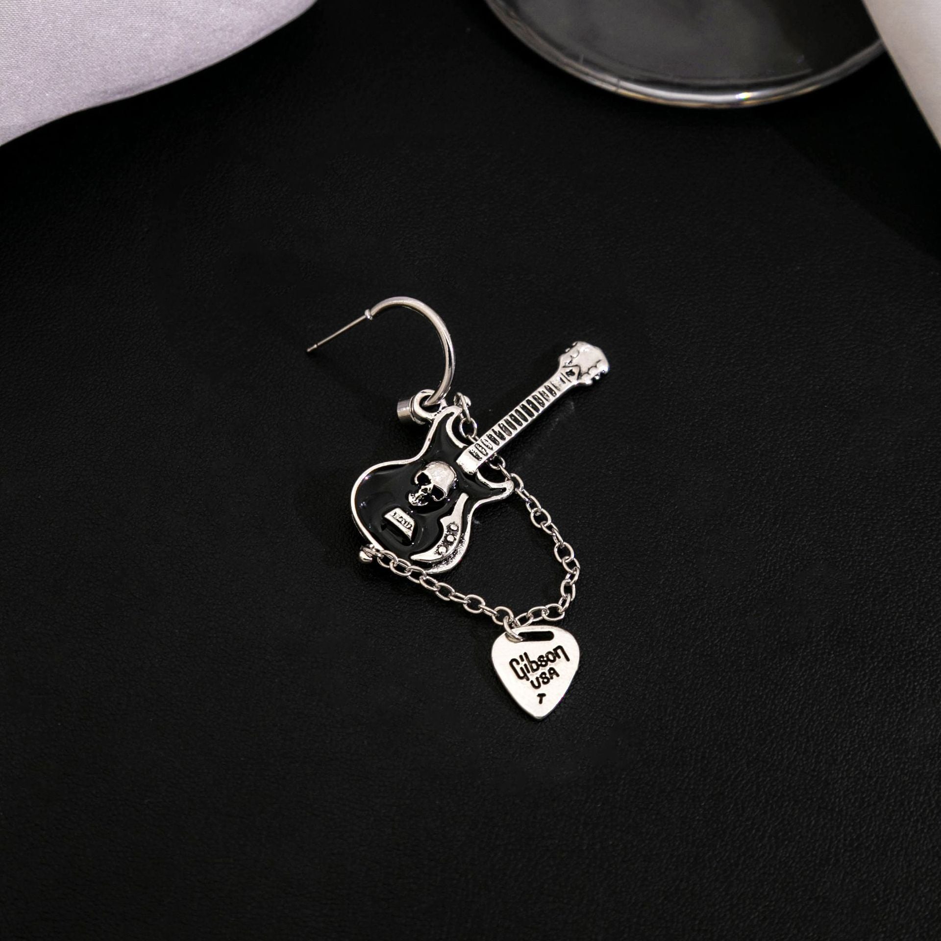 Wholesale Silver Needle Black Guitar Chain Alloy Earrings