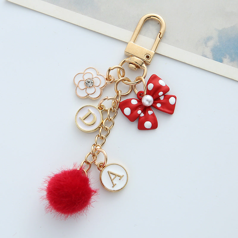 Wholesale Bowknot Pearl Alphabet Heart Hair Ball Alloy Keychains