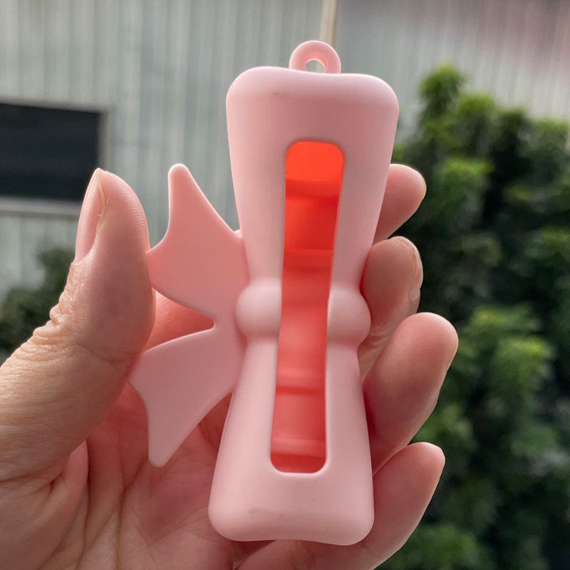 Wholesale Lipstick case silicone protective case bow lipstick bag keychain