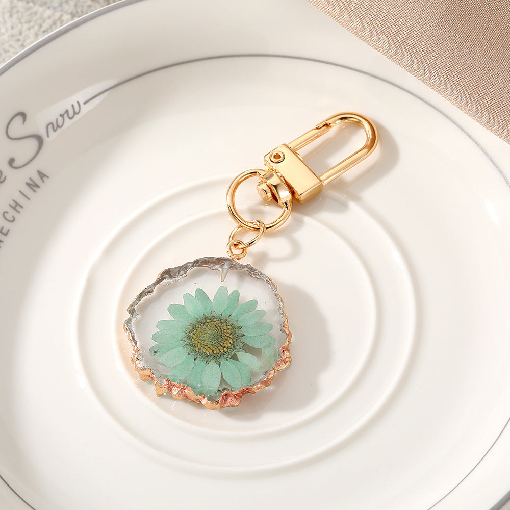 Wholesale Creative Frosted Epoxy Dried Flower December Flower Keychain