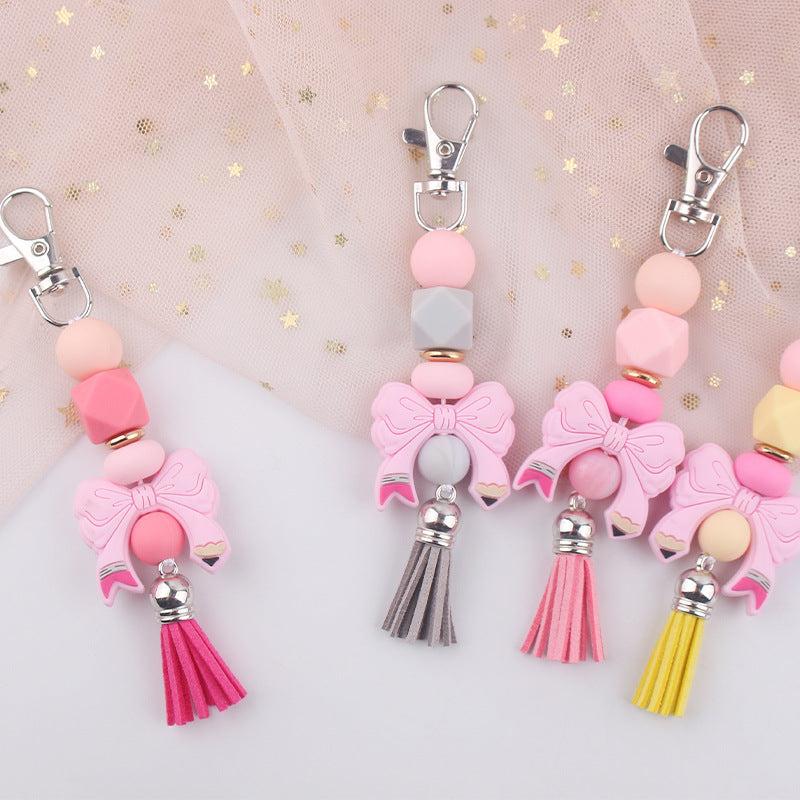 Wholesale Bow Silicone PU Short Tassel Keychain
