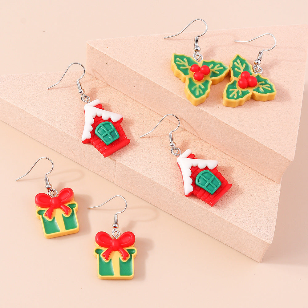 Wholesale Christmas Cartoon Cream Gum Resin Cottage Clover Plastic Earrings