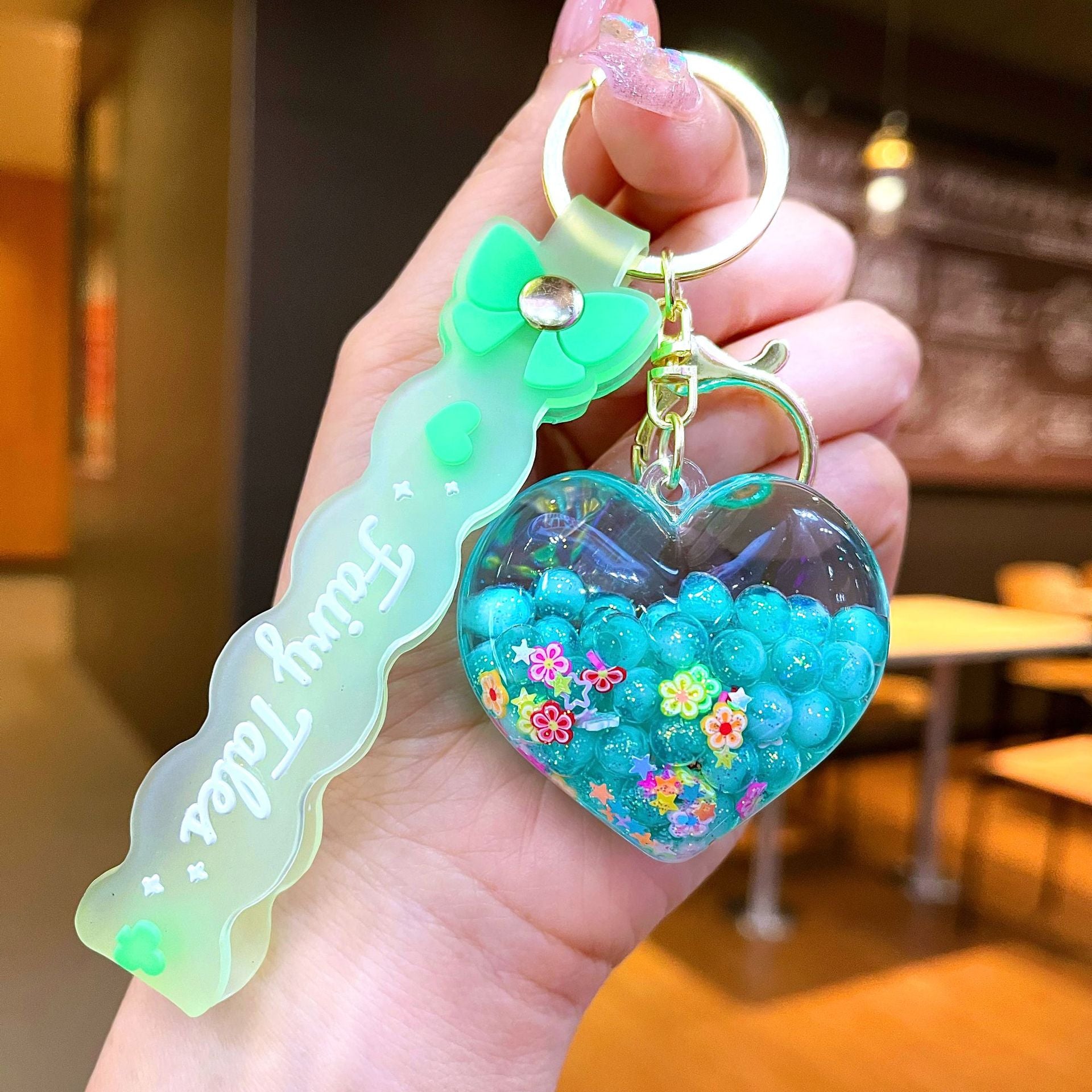 Wholesale Creative Summer Colorful Sand Heart Glow-in-the-Dark Keychain