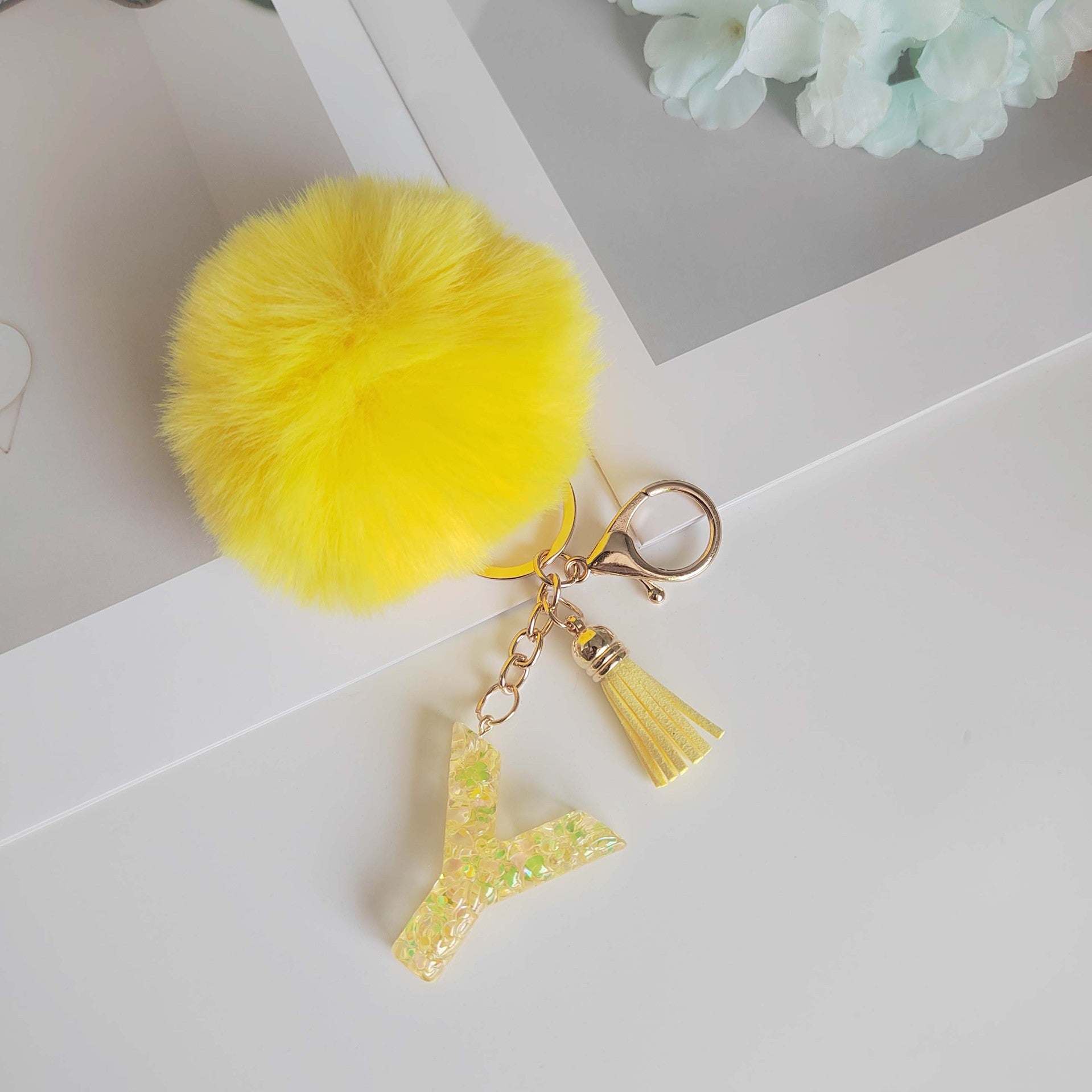 Wholesale Yellow letter ball pendant flower shaped letter keychain