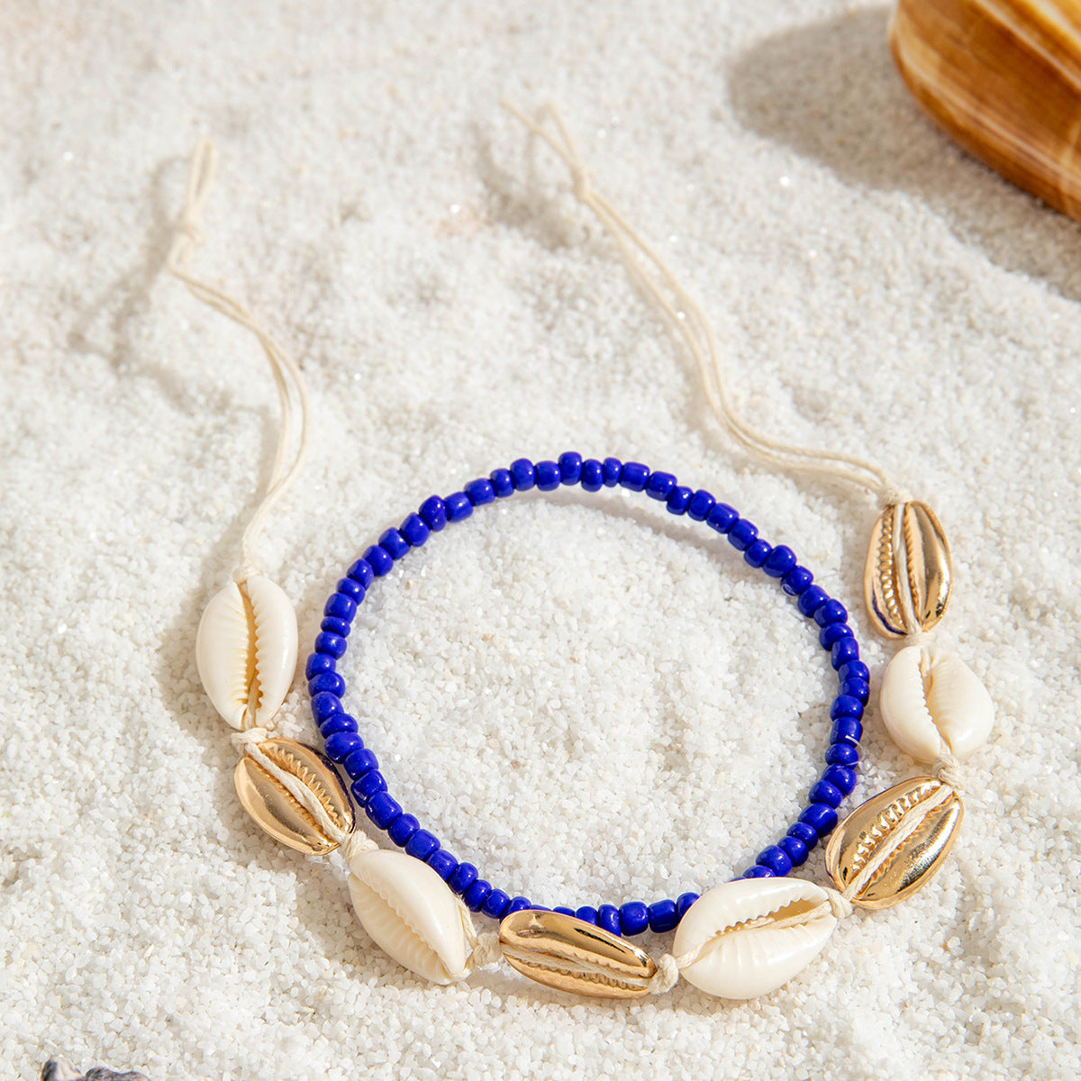 Two pieces of hand-woven anklets from shells