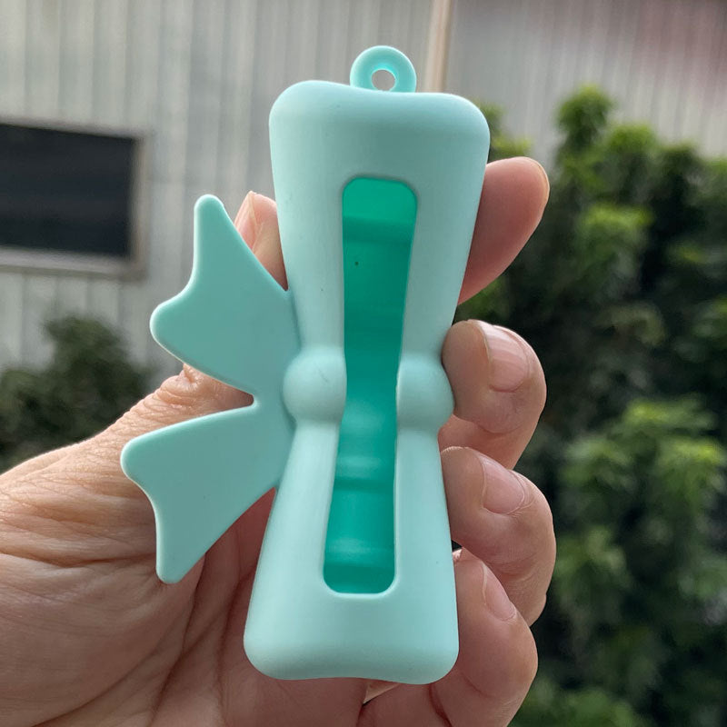 Wholesale Lipstick case silicone protective case bow lipstick bag keychain