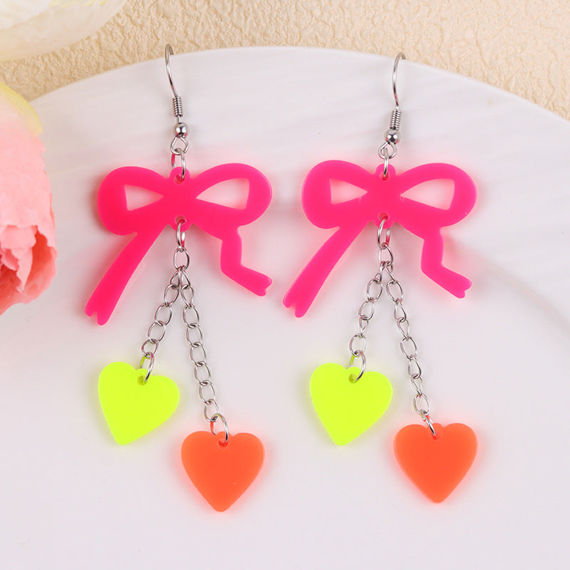 Wholesale Valentine' s Day fluorescent bow heart acrylic earrings