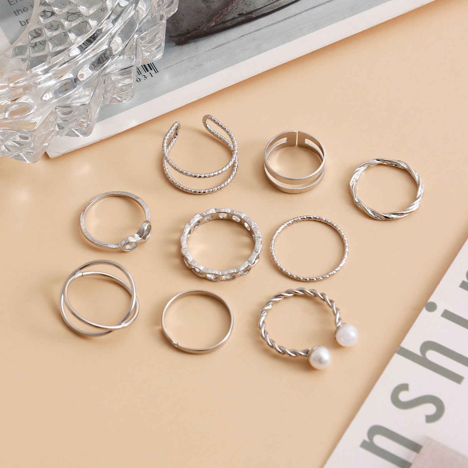 Wholesale Hollowed Out Geometric Wave Shaped Pearl Opening 9-piece Set of Rings